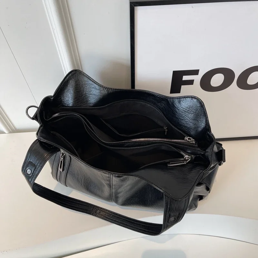 Uma Shoulder Bags